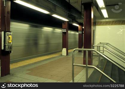 Subway Train Racing Through The Station
