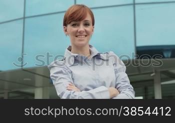 Success, business, career and young women, portrait of happy female manager smiling at camera near office. Sequence with slow motion
