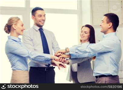 success, business, office and winning concept - happy business team celebrating victory in office