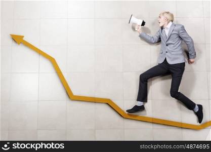 Success in business. Businessman running on increasing graph. Growth concept