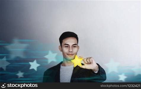 Success in Business or Personal Talent Concept. Happy Businessman Employee Smiling and Showing a Golden Star in Hand