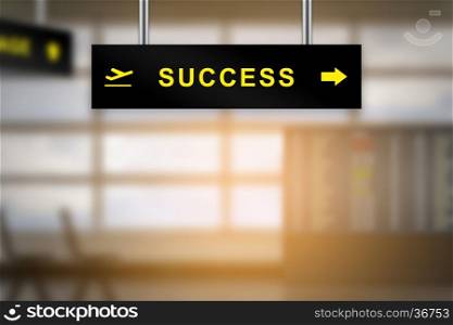 success on airport sign board with blurred background and copy space