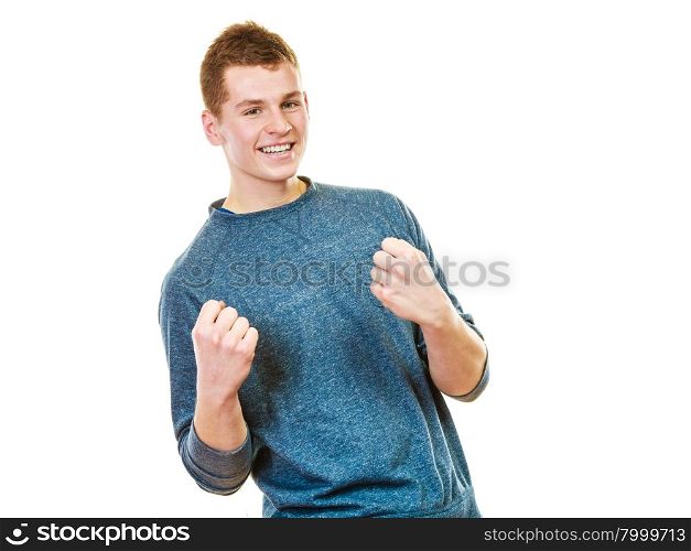 Success positive emotions. Happy young man successful lad with arms up clenching fist isolated on white background
