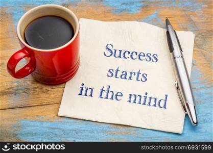 Success starts in the mind - inspirational handwriting on a napkin with a cup of coffee