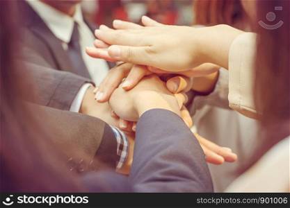 Success Teamwork Concept Business people joining hands city background.