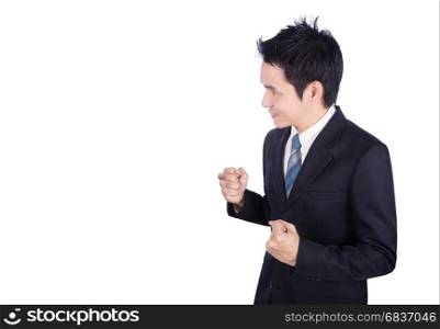 Successful business man with arm raised isolated on white background