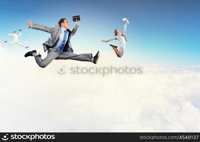 Successful business people. Image of happy business people jumping high in sky