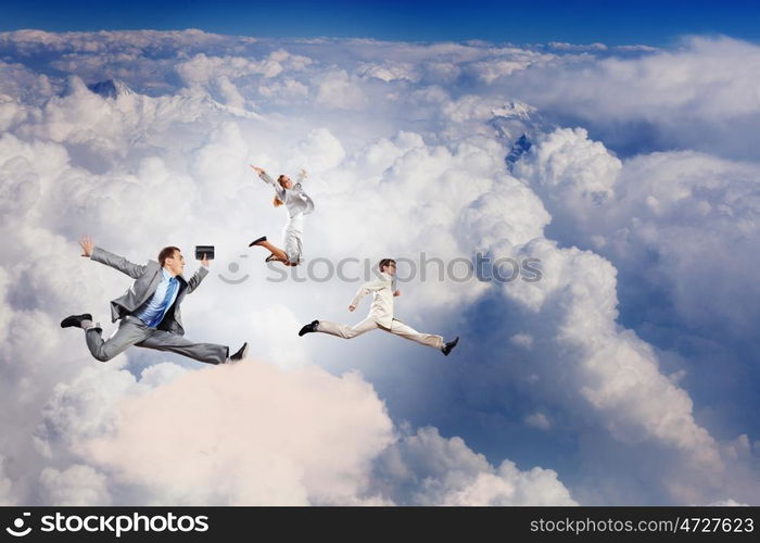 Successful business people. Image of happy business people jumping high in sky