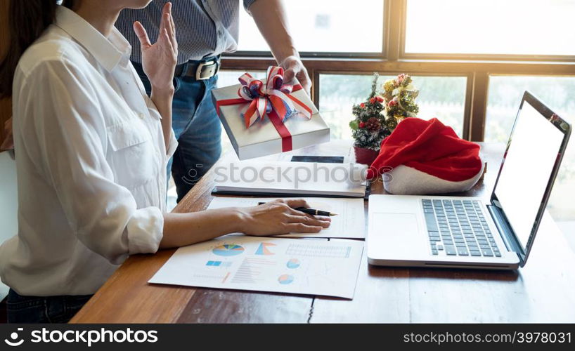 successful Business people wearing Santa hat celebrating 2019 New Year Christmas presents at office party, having great time