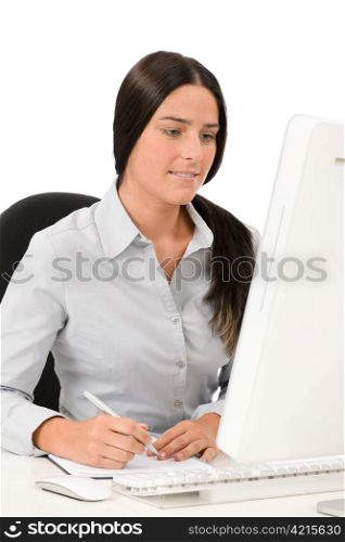 Successful business woman at office concentrating sitting table write notepad