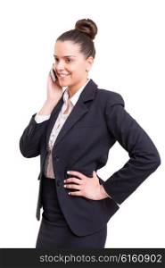 Successful business woman at the phone, isolated over white