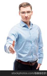 Successful businessman in a shirt extends a hand for greetings on a white background