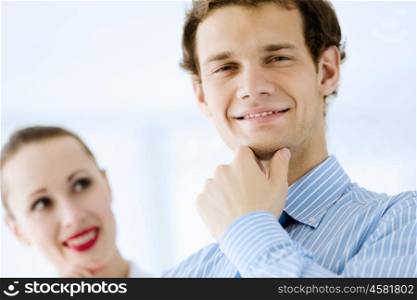 Successful businesspeople. Image of businessman and businesswoman smiling joyfully