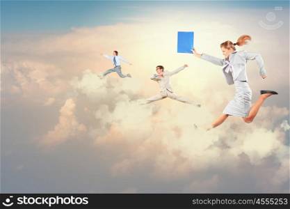 Successful businesspeople. Image of businesspeople jumping high in sky