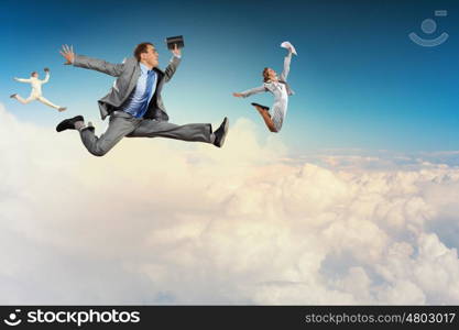 Successful businesspeople. Image of businesspeople jumping high in sky