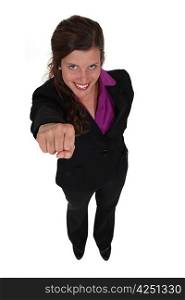 successful businesswoman raising her fist