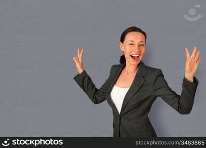 Successful businesswoman showing satisfaction