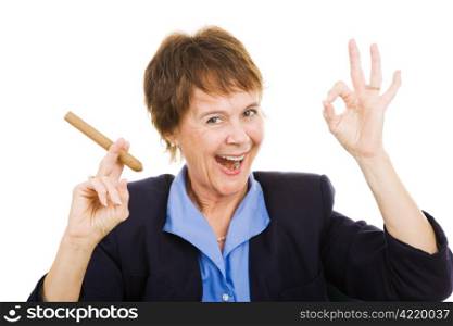 Successful businesswoman smoking a cigar and giving the AOkay sign. Isolated on white.