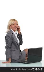 Successful businesswoman talking on her mobile phone