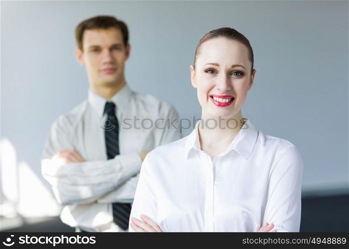 Successful businesswoman. Young happy businesswoman with colleague. Leadership concept