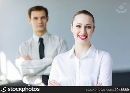 Successful businesswoman. Young happy businesswoman with colleague. Leadership concept