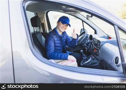 successful delivery worker showing thumb up