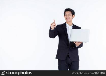 successful Happy of asian young businessman a successful business hold laptop computer with pointing hand gestures finger touch imagery panel isolated on white grey blank copy space studio background