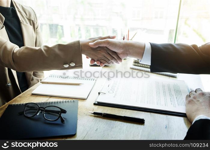Successful job interview with boss and employee handshaking after good deal, Congratulation, merger and acquisition partnership meeting concept.