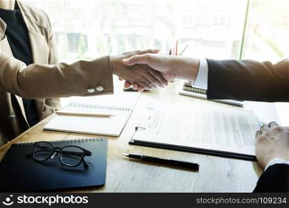 Successful job interview with boss and employee handshaking after good deal, Congratulation, merger and acquisition partnership meeting concept.