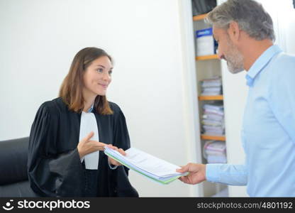 successful judge woman showing legal document