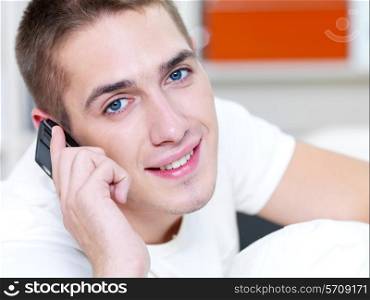 successful man call in the phone on white background