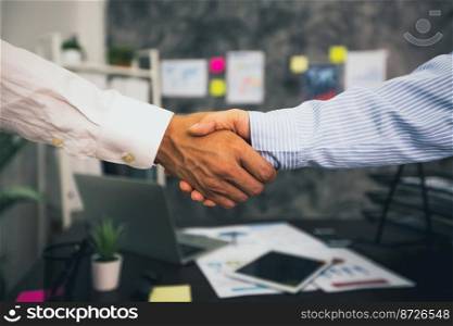 successful negotiate and handshake concept, two businessman shake hand with partner to celebration partnership and teamwork, business deal   