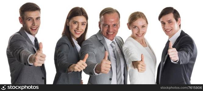 Successful smiling business team with thumbs up isolated over a white background. Business team with thumbs up