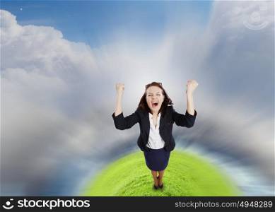 Successful woman. Top view of young pretty businesswoman screaming joyfully