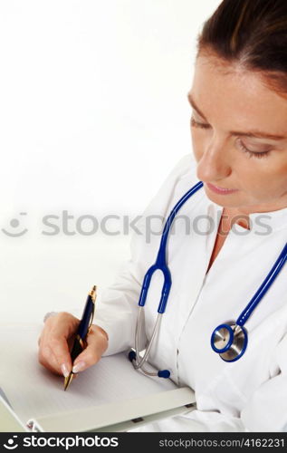 successful young doctor takes notes on a notepad