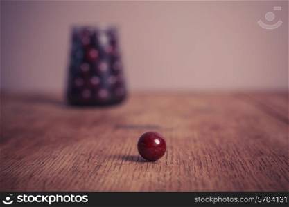 Sugar coated balls on a wooden table