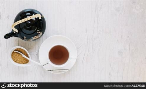 sugar near cup tea teapot