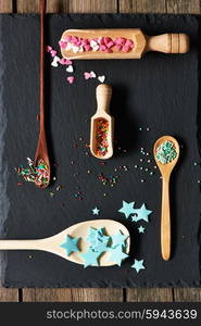 Sugar sprinkle dots on slate background