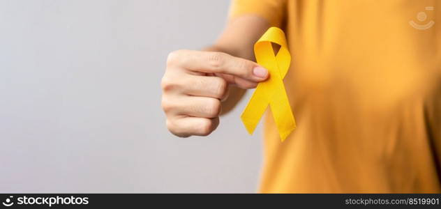 Suicide prevention day, Childhood, Sarcoma, bone and bladder cancer Awareness month, Yellow Ribbon for supporting people life and illness. Healthcare and World cancer day concept