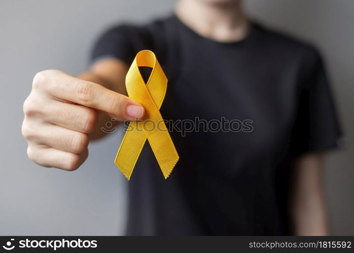 Suicide prevention day, Sarcoma, bone, bladder and Childhood cancer Awareness month, Yellow Ribbon for supporting people living and illness. children Healthcare and World cancer day concept