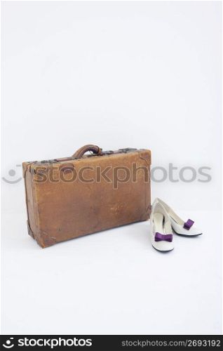 Suitcase and shoes