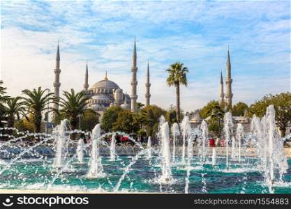 Sultan Ahmed Mosque (Blue mosque) and fountain in Istanbul, Turkey in a beautiful summer day