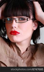 Sultry woman in glasses