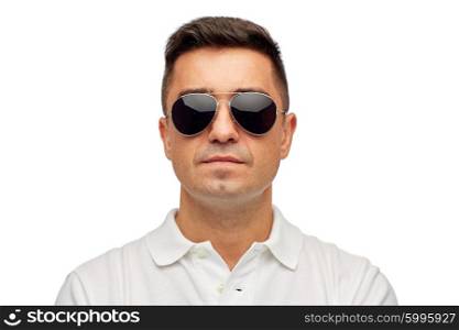 summer, accessories, style and people concept - face of middle aged latin man in white polo t-shirt and sunglasses
