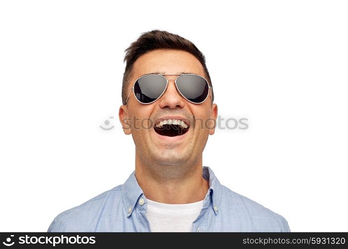 summer, accessories, style and people concept - face of smiling middle aged latin man in shirt and sunglasses
