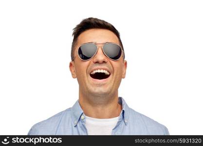 summer, accessories, style and people concept - face of smiling middle aged latin man in shirt and sunglasses