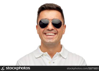 summer, accessories, style and people concept - face of smiling middle aged latin man in white polo t-shirt and sunglasses