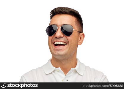 summer, accessories, style and people concept - face of smiling middle aged latin man in white polo t-shirt and sunglasses