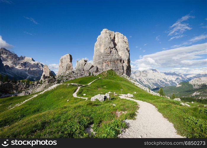 Summer alpine mountain rocky hills panorama. Cinque Torri, Dolomites Alps, Italy