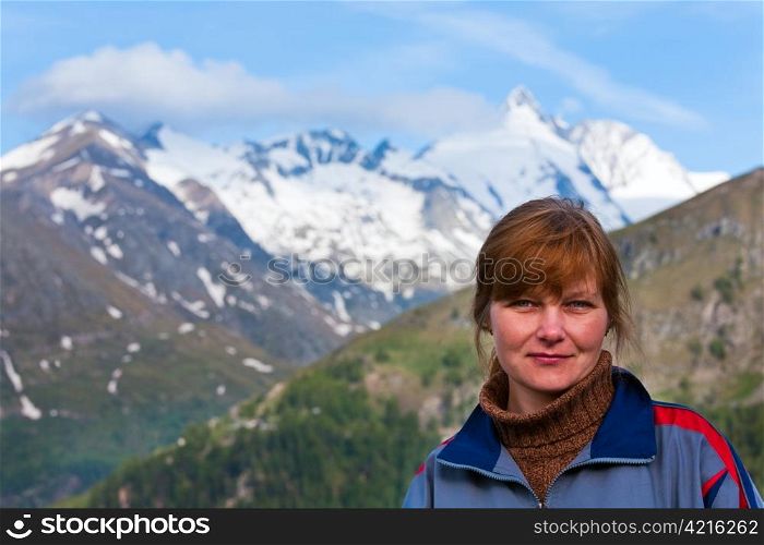 Summer Alps mountain (view from Grossglockner High Alpine Road) and woman portrait.